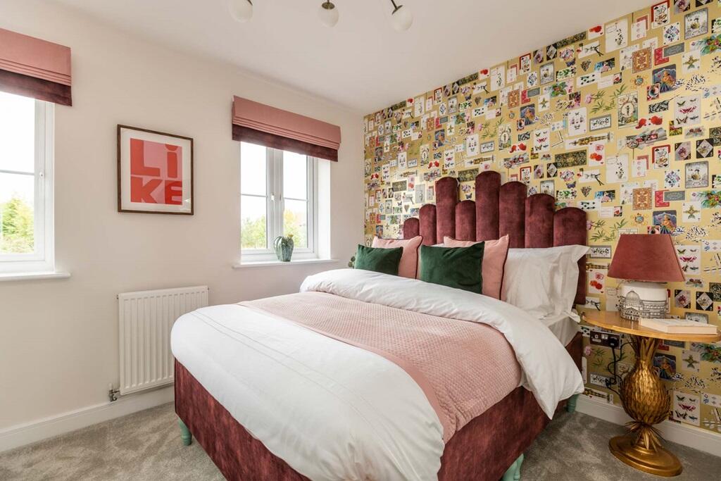 Bedroom two with plenty for space for a double bed, overlooking the rear garden