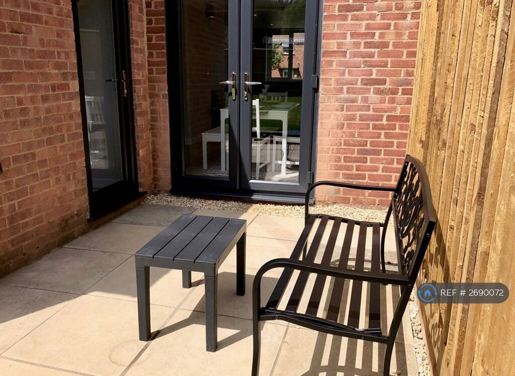 Sunny Patio Area With External Lights
