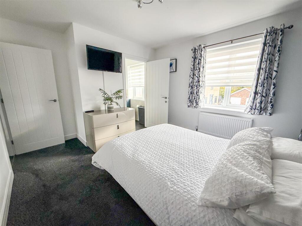 ALTERNATE VIEW OF BEDROOM ONE