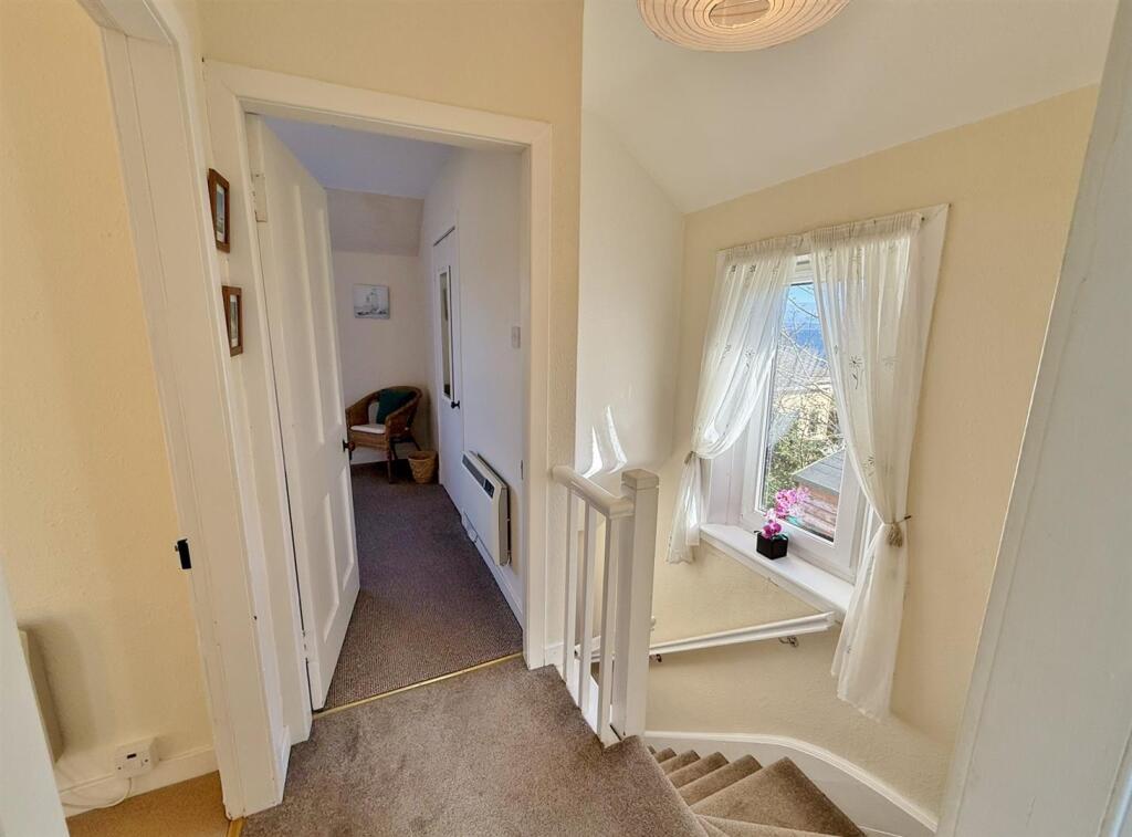 Upper hallway looking to bedroom 2