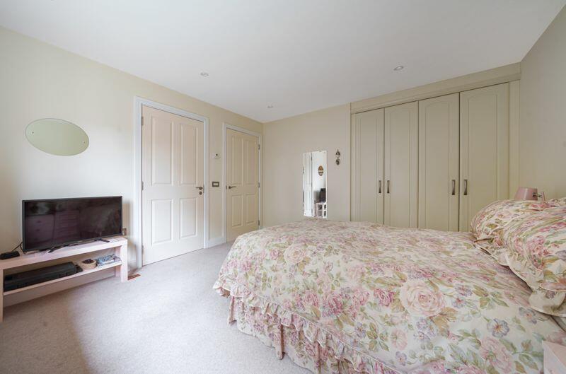 Master bedroom with fitted wardrobes