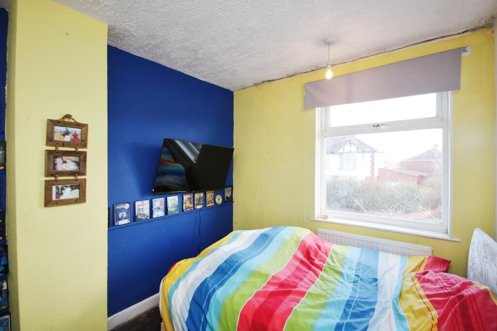 Dea834b4-Bedroom 202.JPG