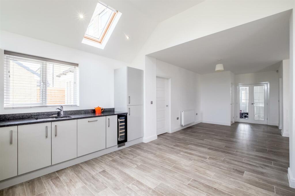 Open plan Kitchen/Dining/Living space