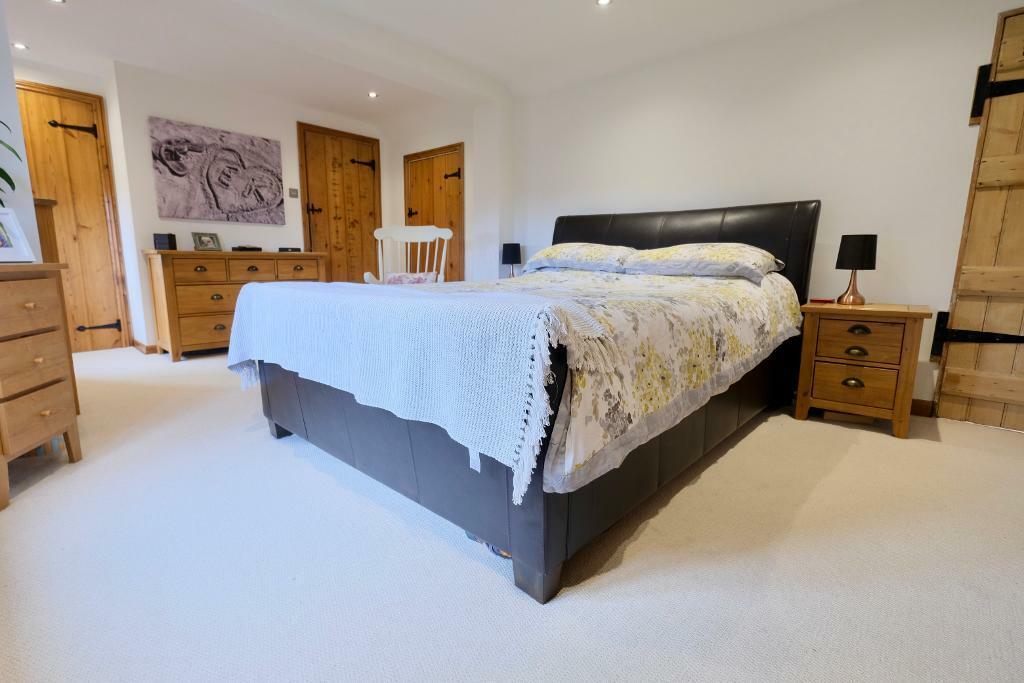 Bedroom 1 with walk-in wardrobe