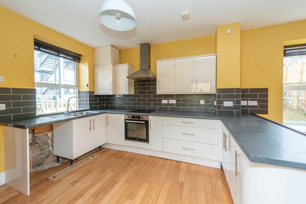 SITTING ROOM LOUNGE AND DINING KITCHEN