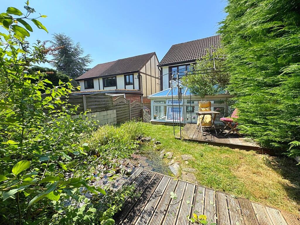 Rear garden to ex...