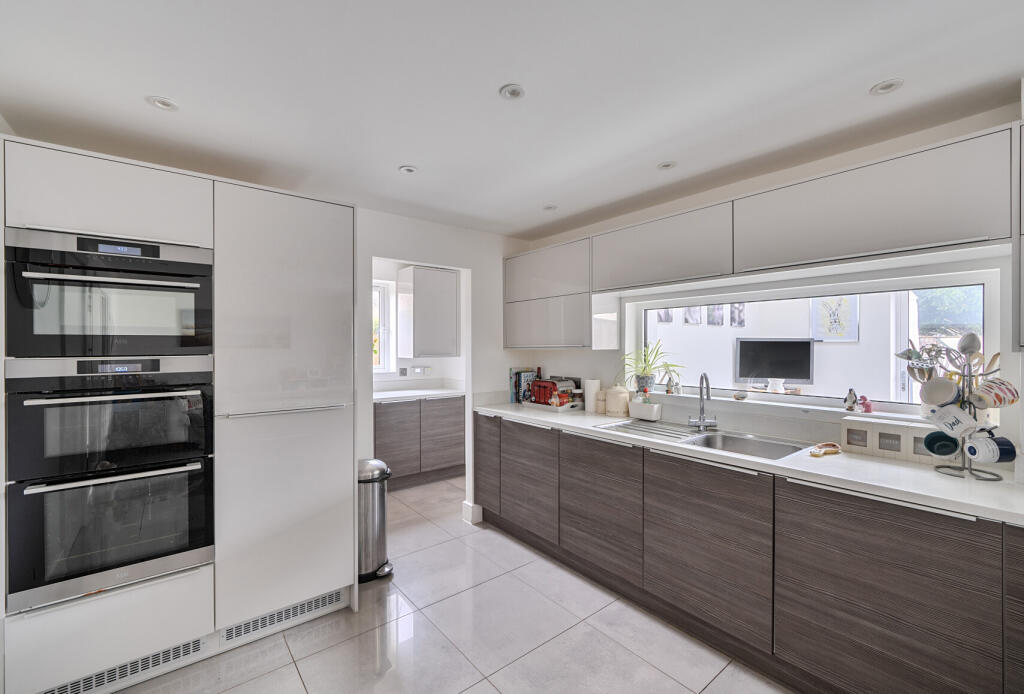 1387112-11-69400a...