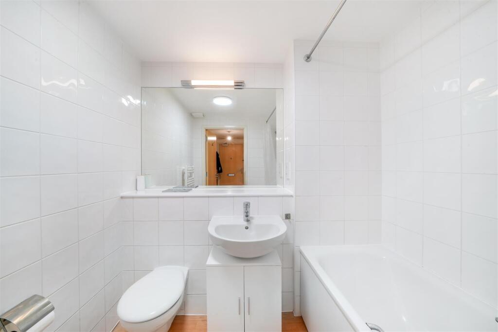 Fully tiled family bathroom