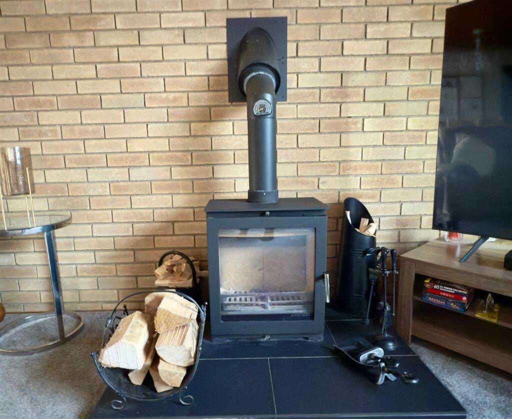 LOG BURNER LOUNGE.jpg