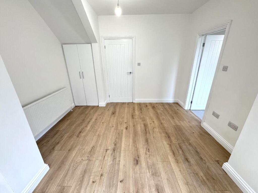 DINING AREA INTO KITCHEN