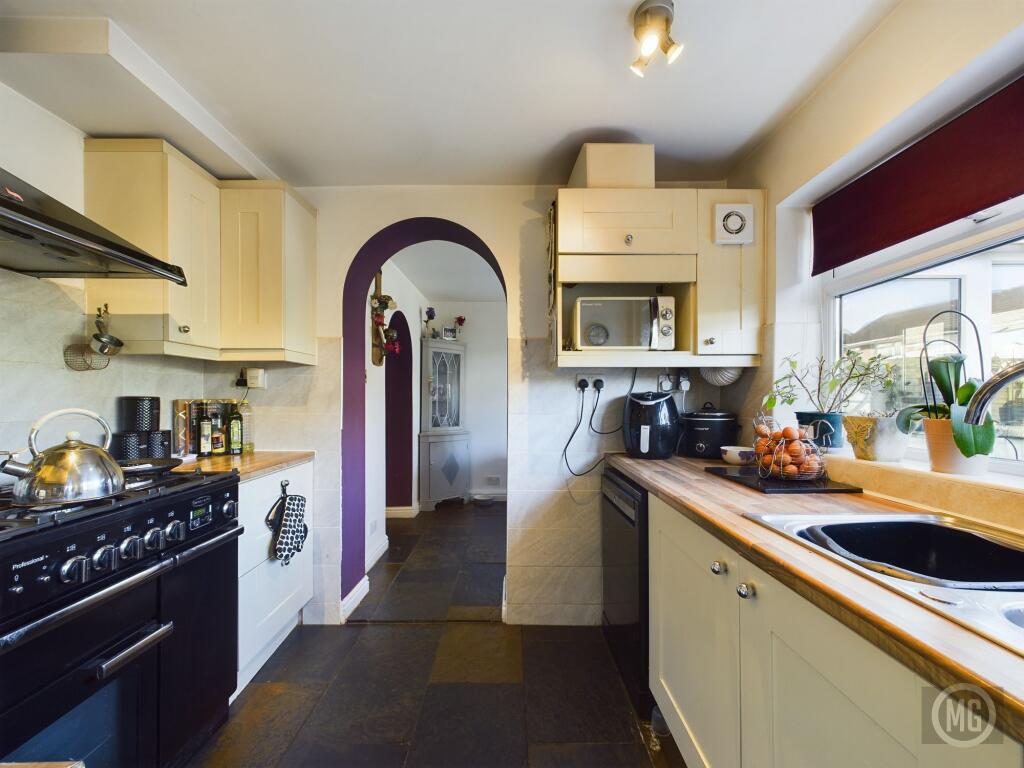 Kitchen leading into Dining Room