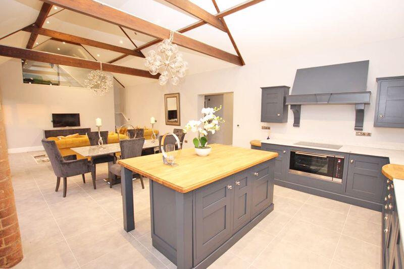 Open plan kitchen breakfast dining an...