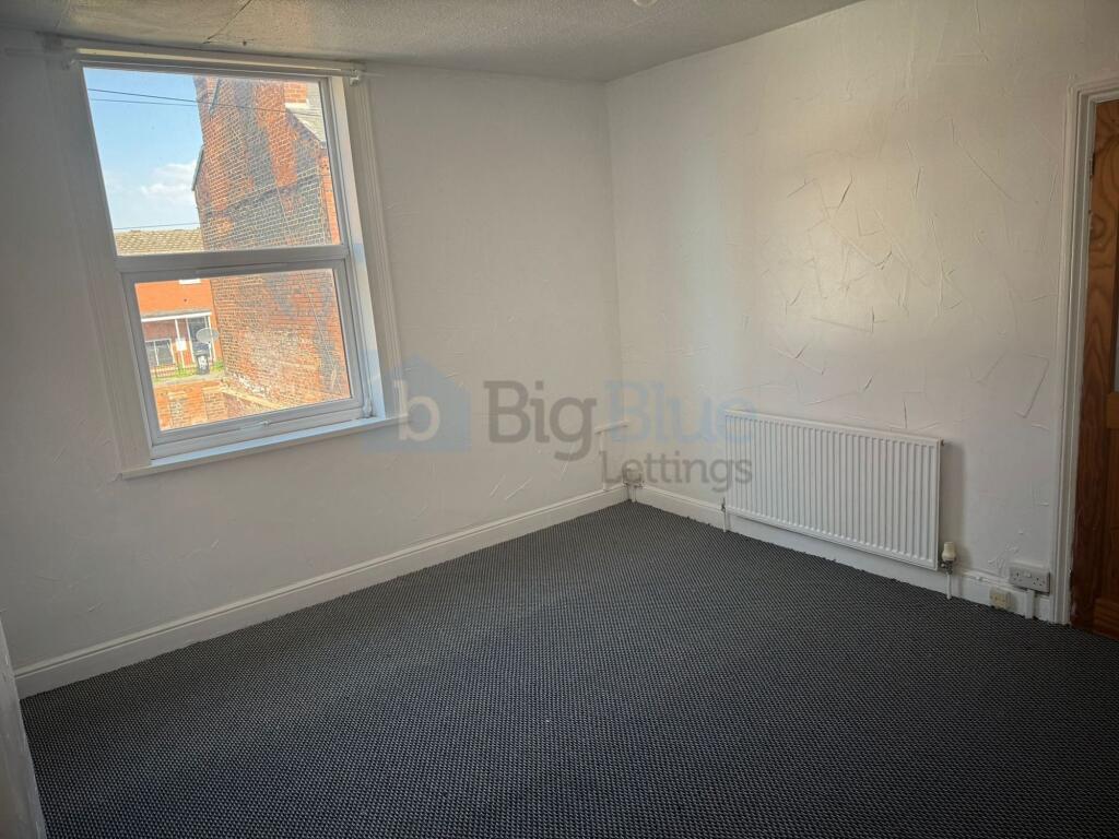 Bright and inviting double bedroom featuring a ...