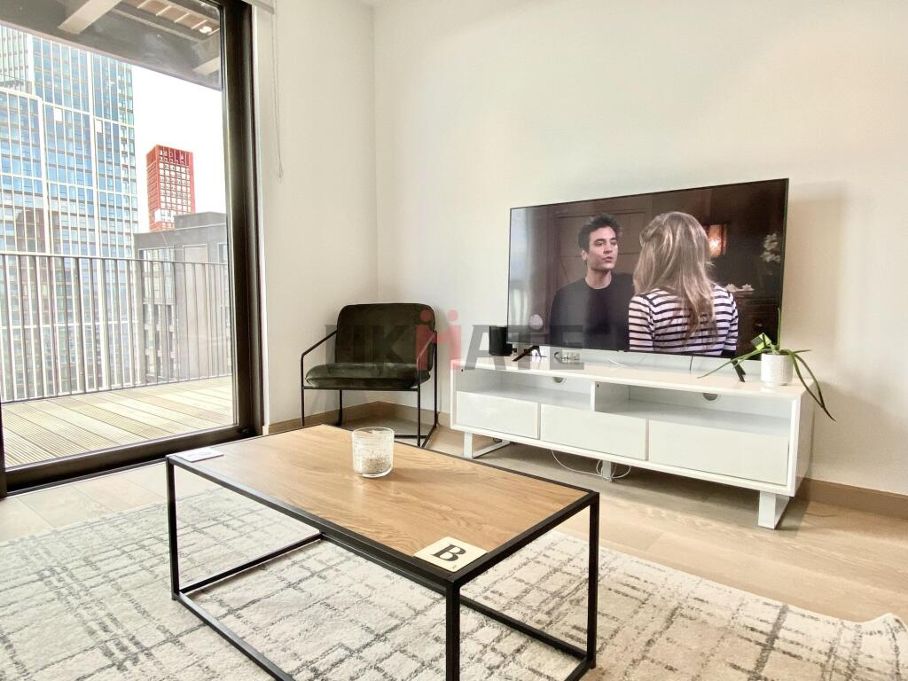 Modern living room with large window providing ...