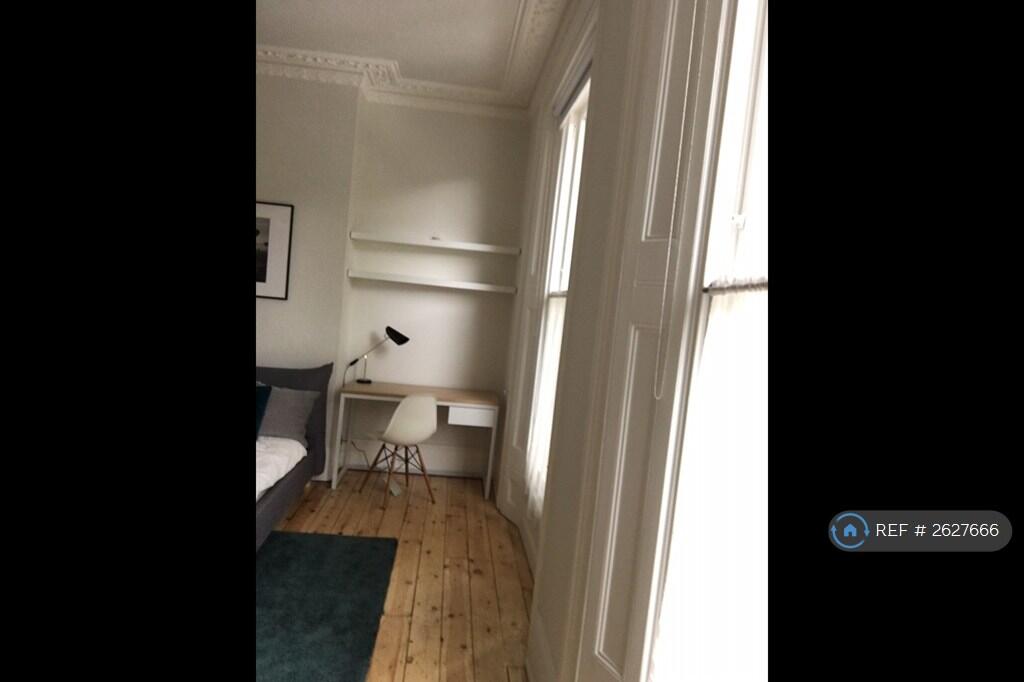 Habitat Bucket Chair, Reading Lamp, Desk, Shelves.