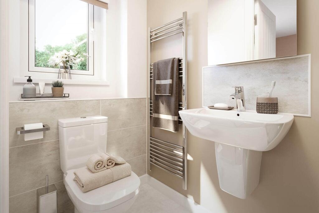 Bedroom 1 also hosts a private en suite shower room
