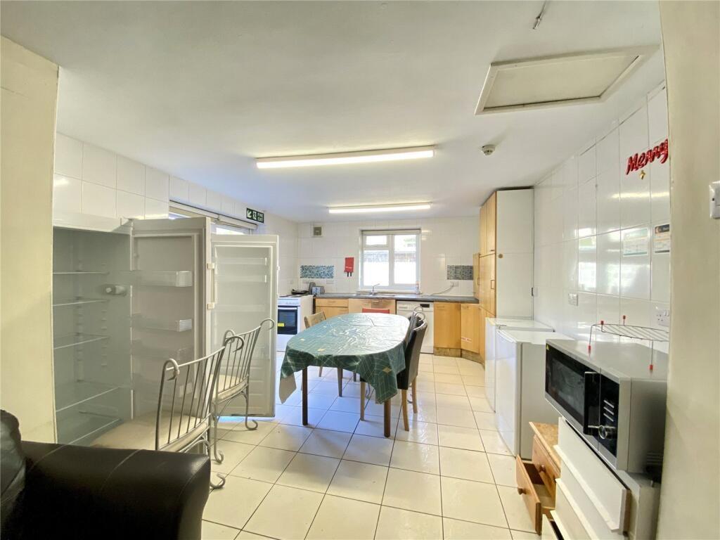 Bright and functional kitchen featuring ample n...