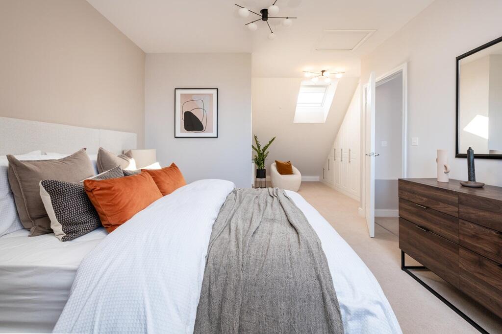 The main bedroom has its own dedicated dressing area