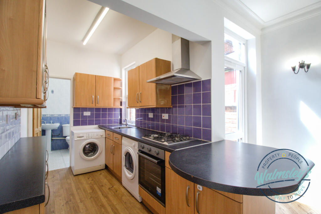 Open plan kitchen into sitting room