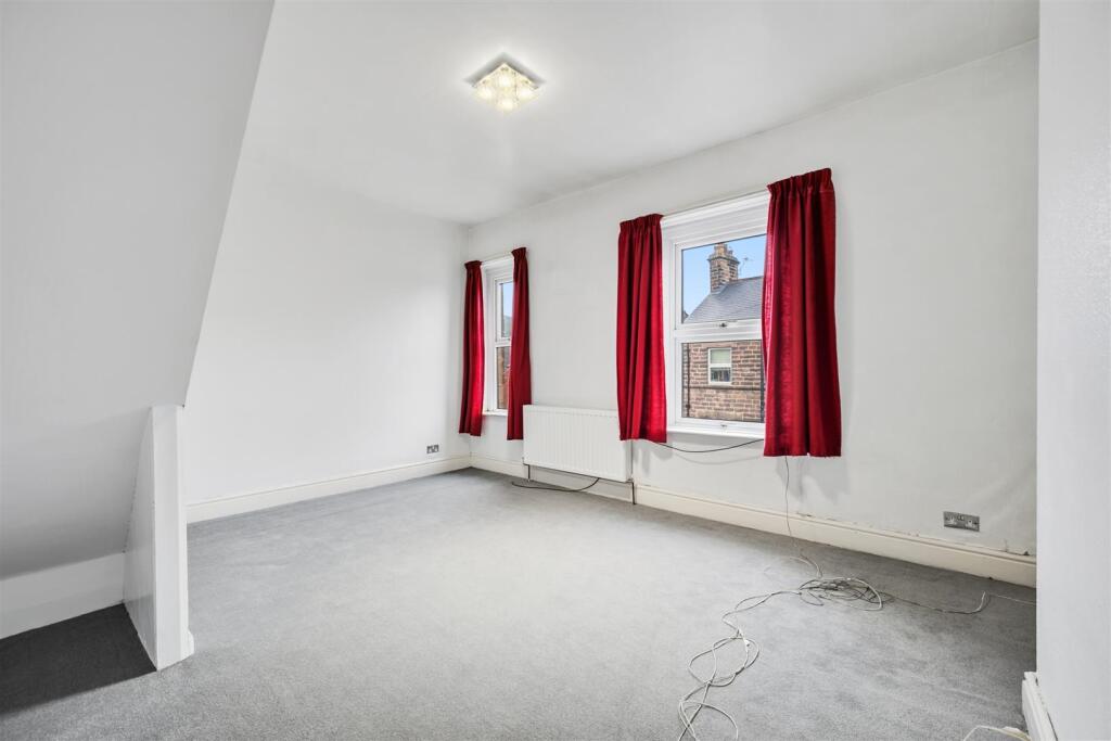 Bedroom Two to windows.jpg