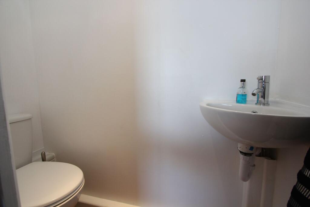 WC to Bedroom One