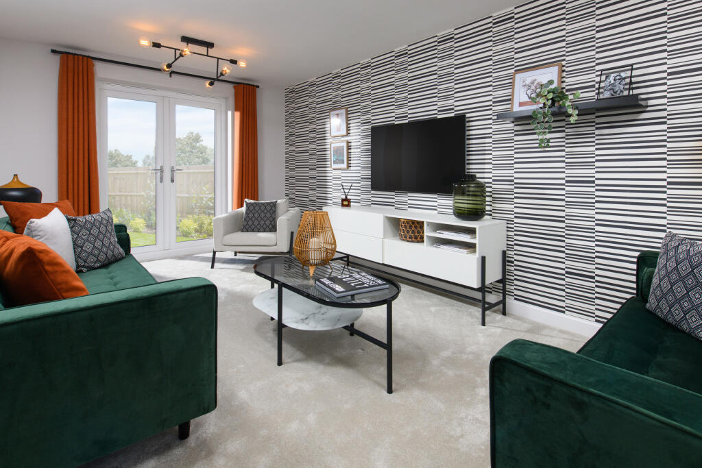 Inside 4 Bedroom Alderney lounge with French doors