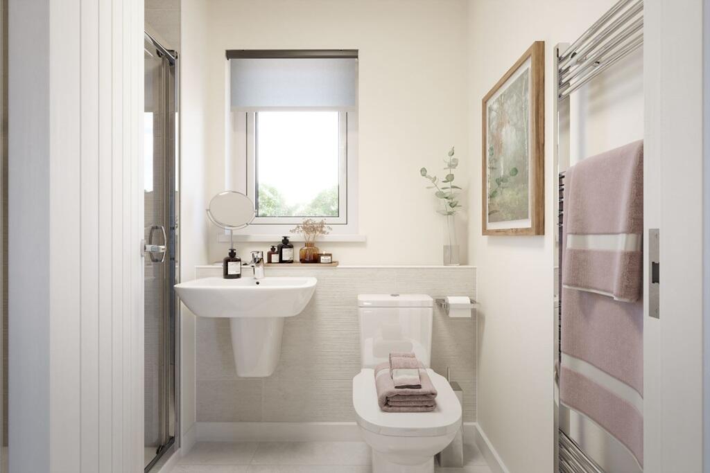 The en-suite features a large double shower