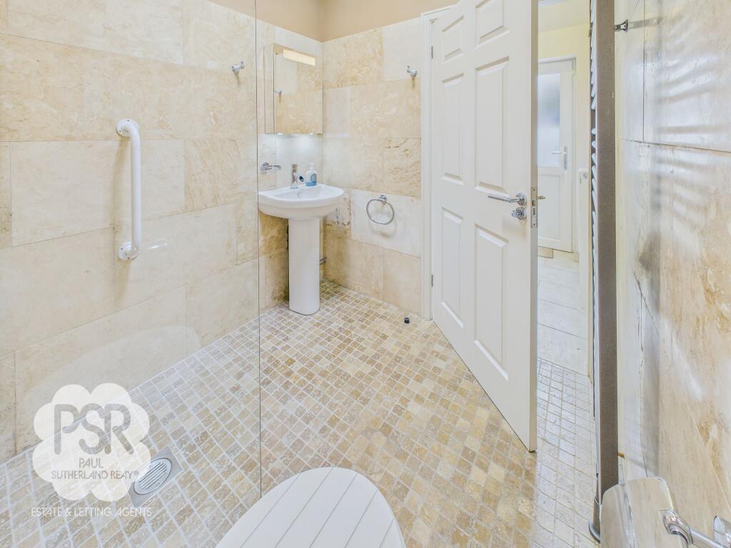 Travertine Tiled Ground-Floor Wetroom