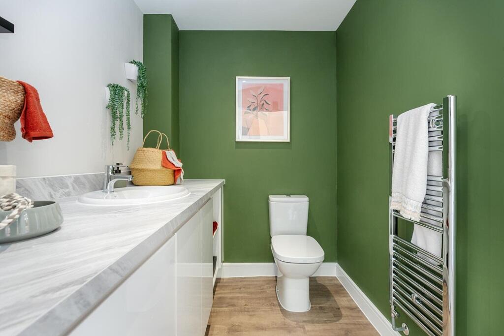 Downstairs cloakroom/utility with additional storage
