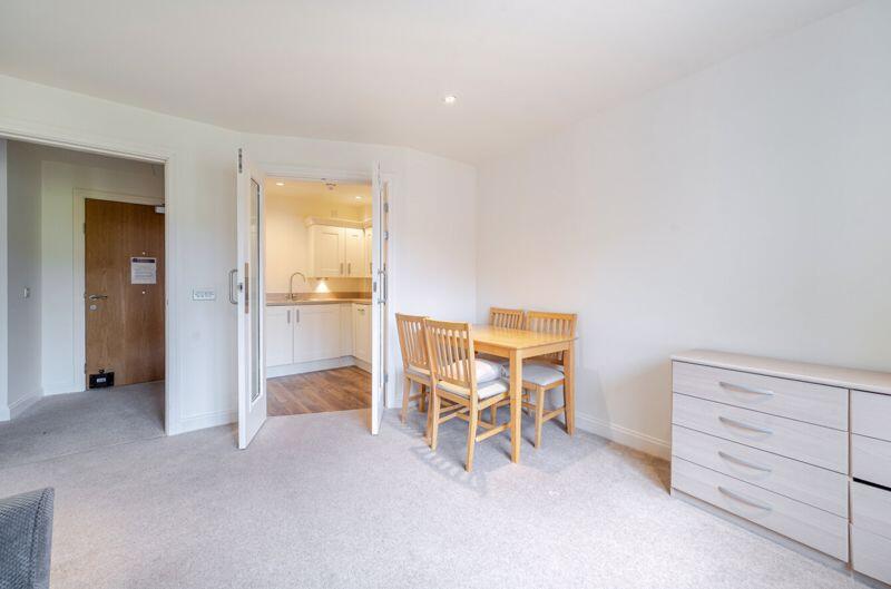 Living/dining room through to kitchen