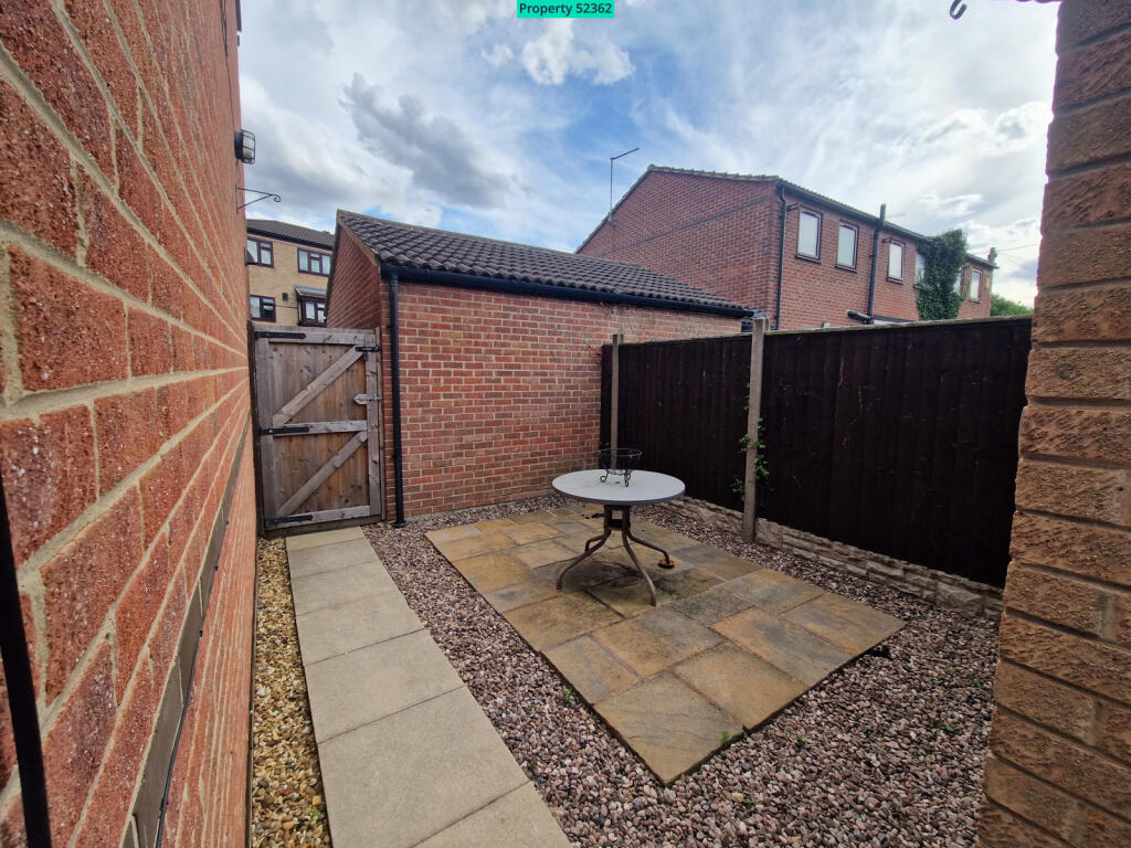 Second private side patio with gate to front