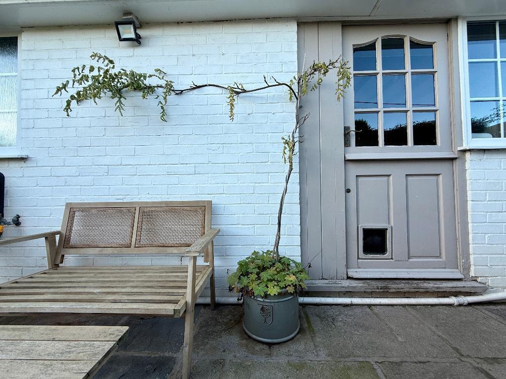 Back door and seating area