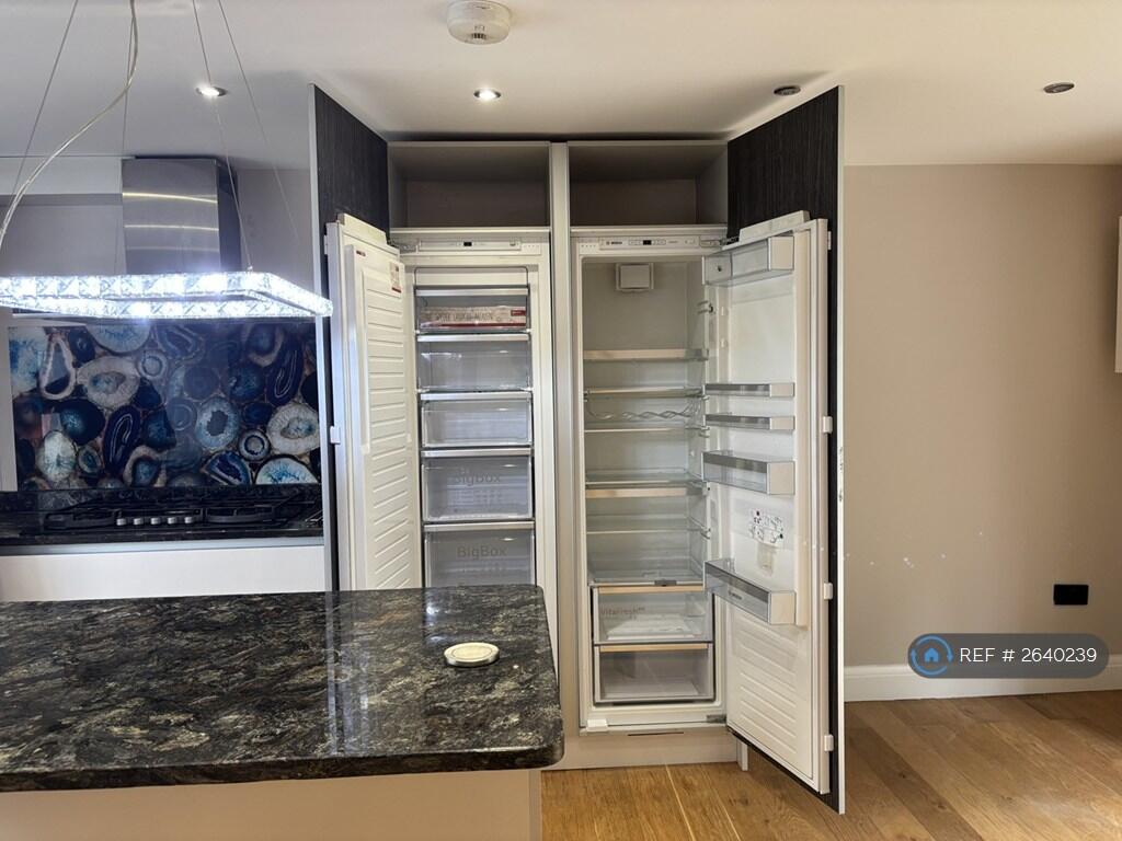 Kitchen With Tall Integrated Fridge Freezer 