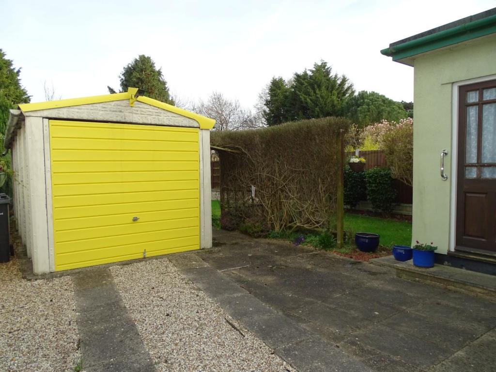 GARAGE AND REAR PATIO AREA