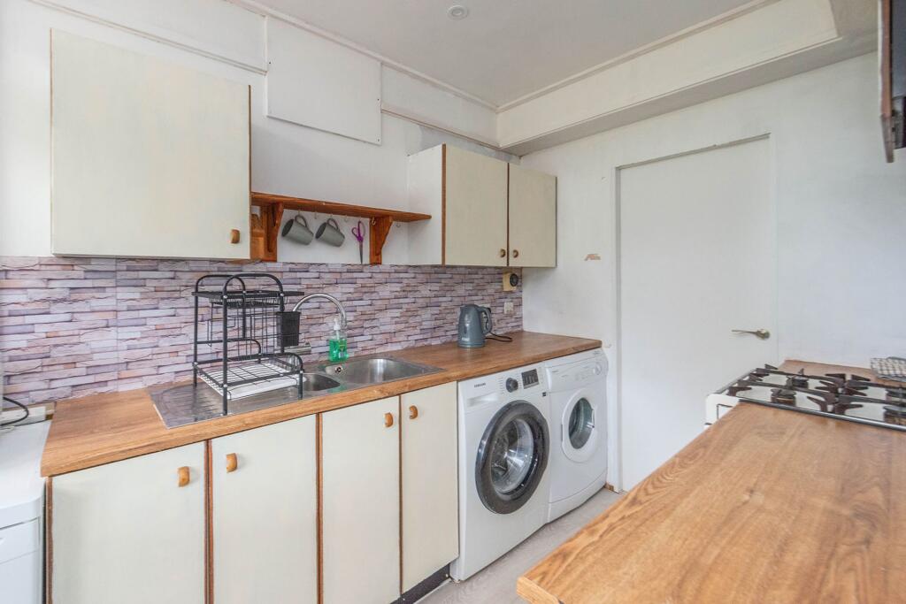 SITTING ROOM DINING ROOM AND KITCHEN
