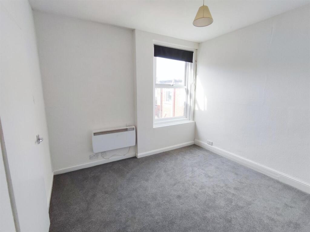 First flr flat 99 Nelson Road Central bedroom.jpg