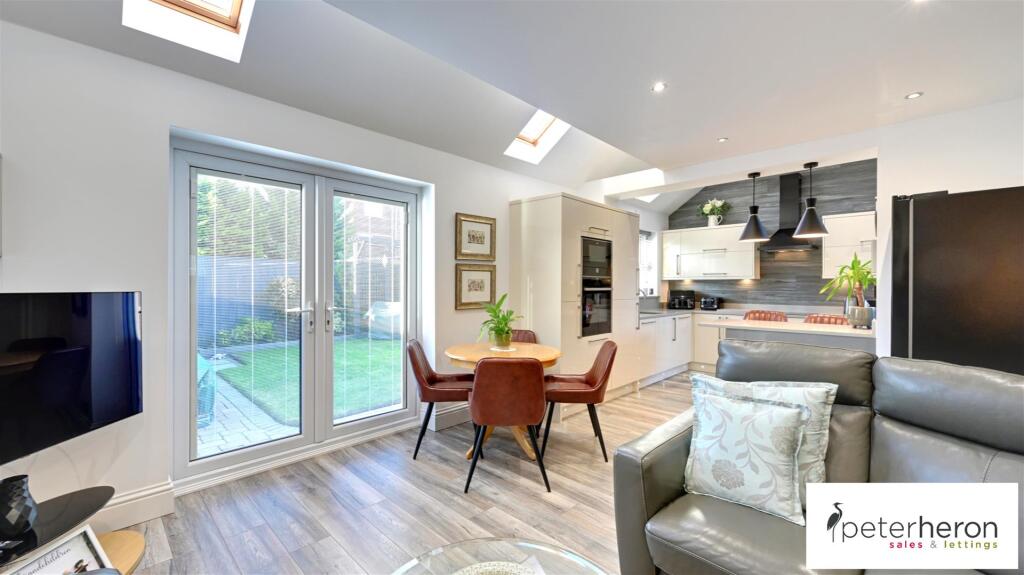 Open Plan Dining Kitchen And Family Area