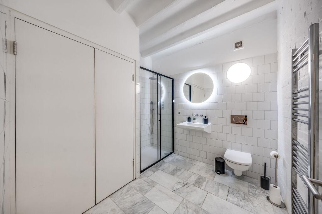 Experience a stylish and spacious bathroom suit...