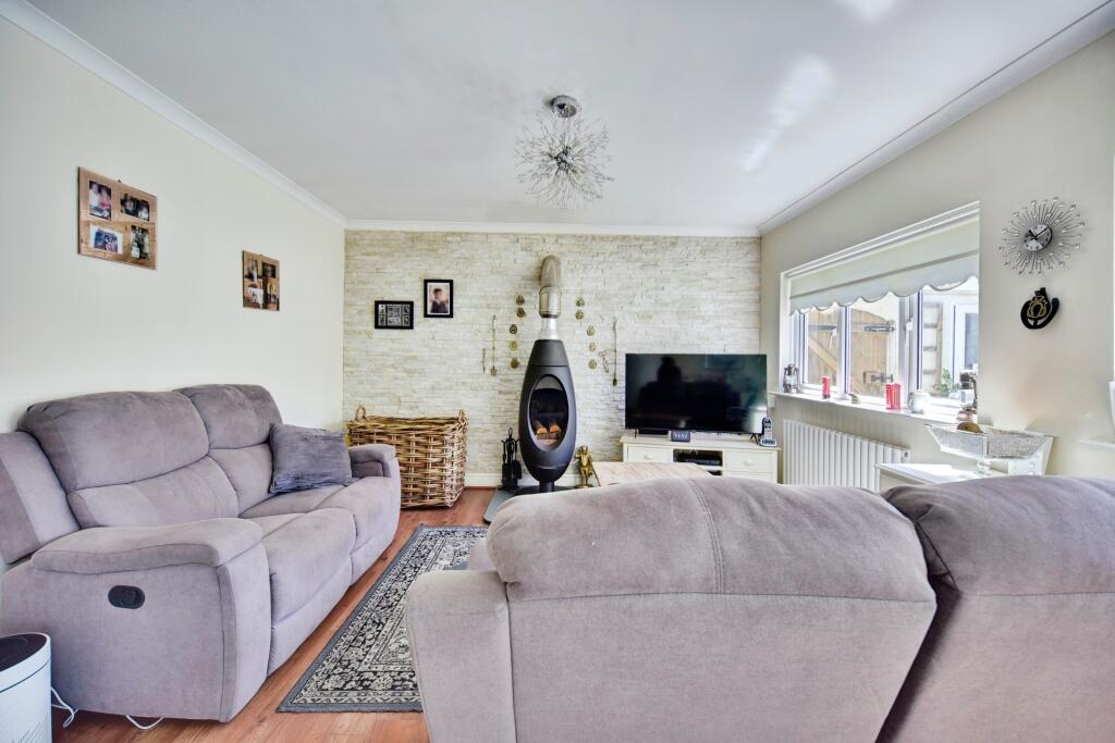 Open Plan Lounge With Log Burner