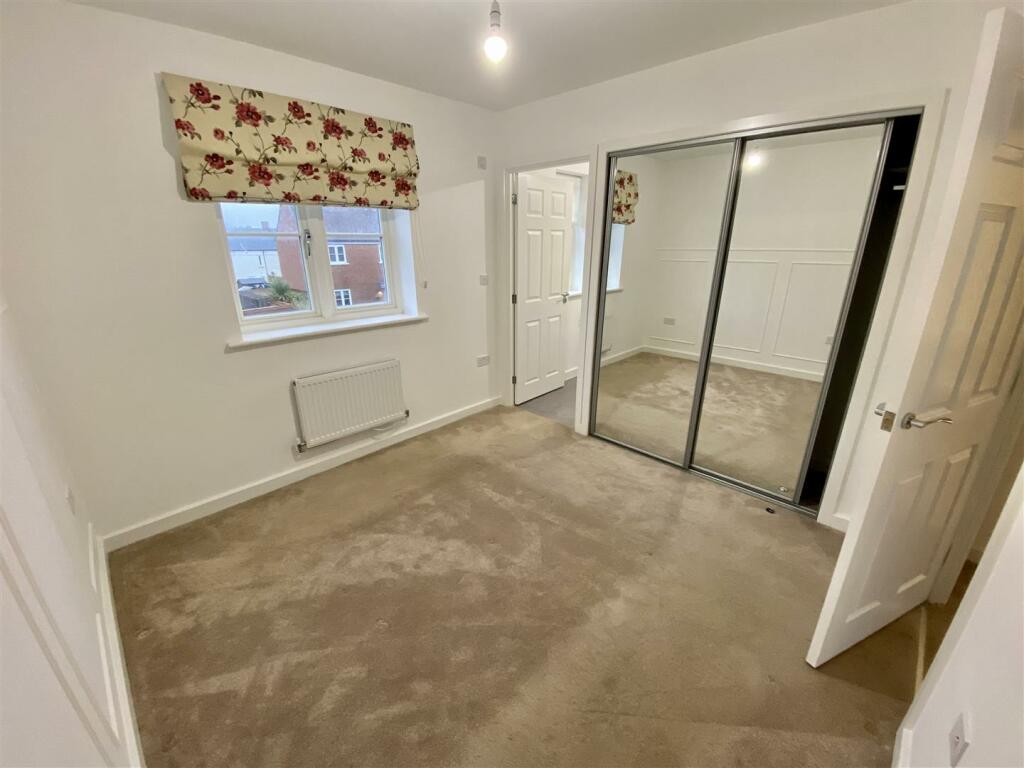 Master Bedroom with Built In Wardorbes