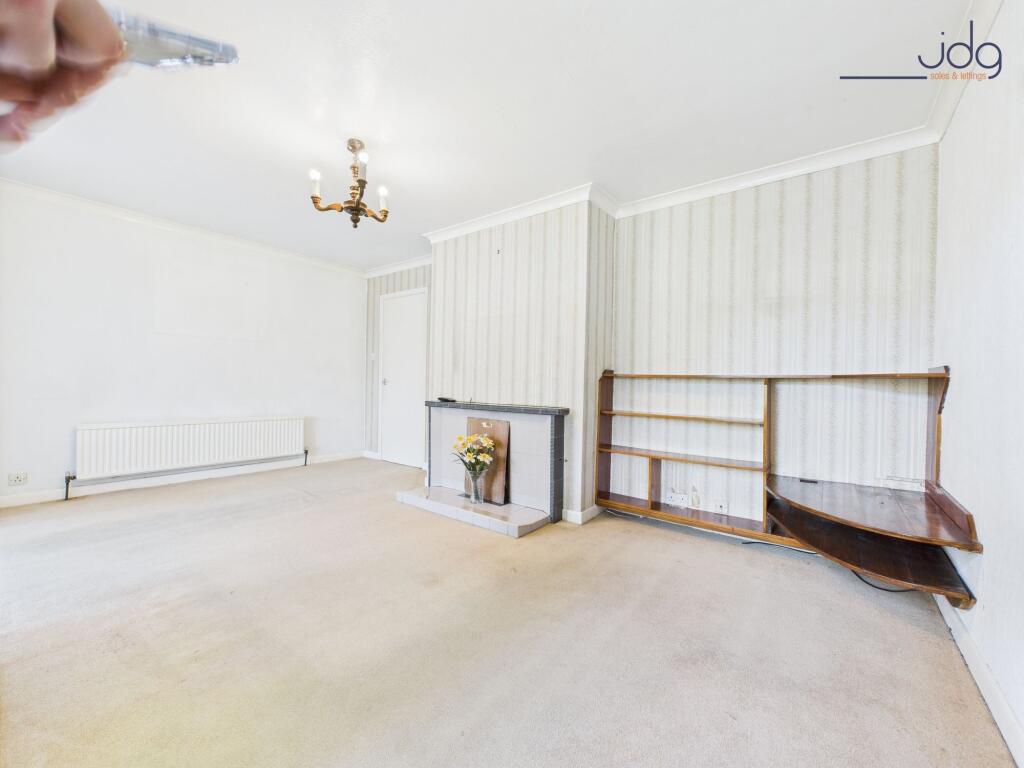 Living Room with patio doors to the Conservatory