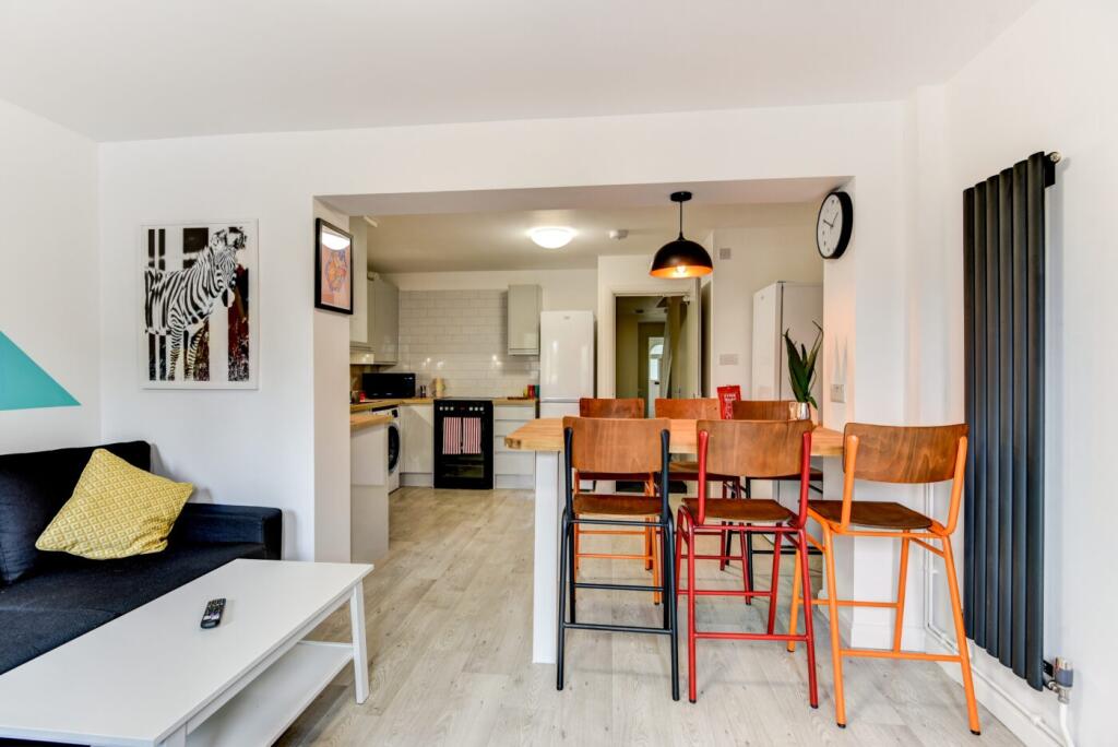 Bright open-plan living area with a comfortable...