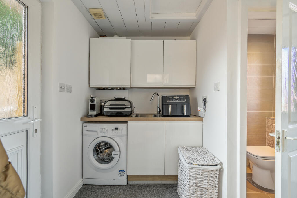 Utility Room/ Downstairs W.C