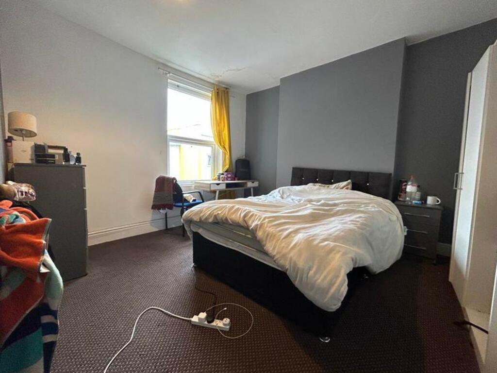 A spacious and bright double bedroom, perfect f...