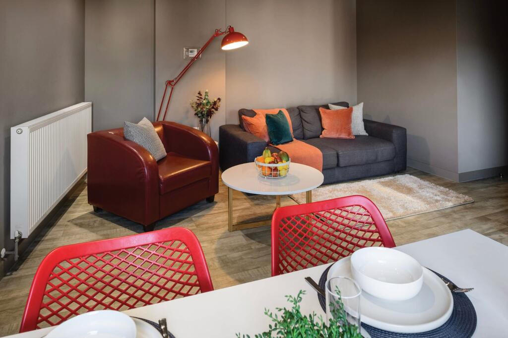 A stylish and inviting living room featuring a ...