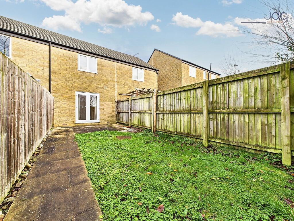 Spacious Garden with a mixture of lawn and flagged areas