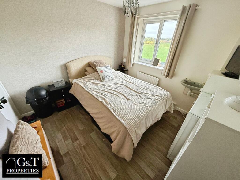 SECOND BEDROOM