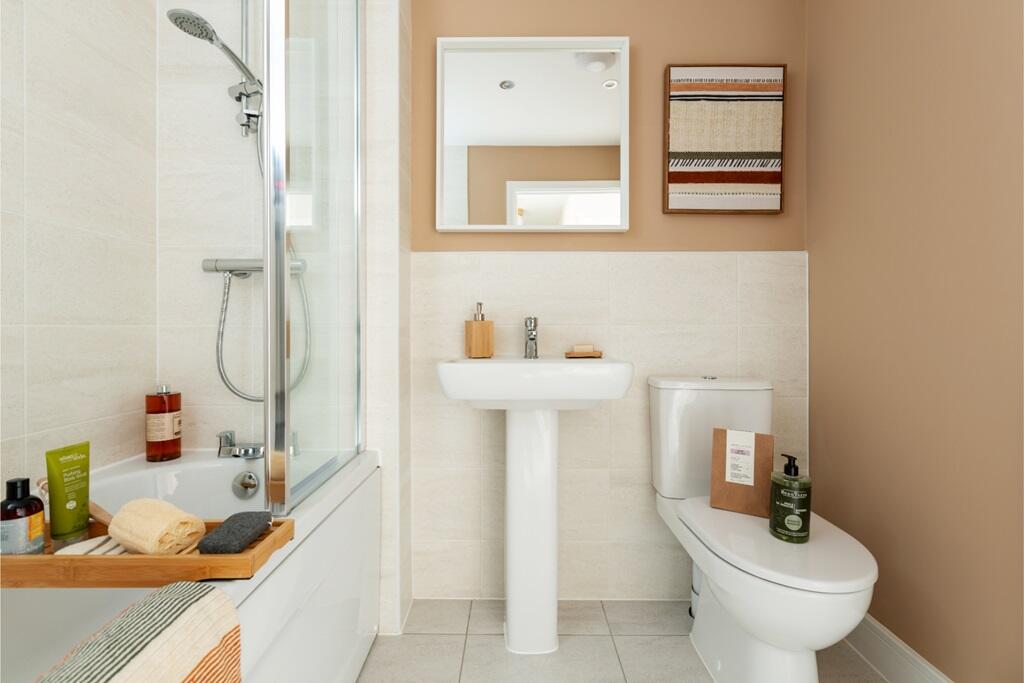 Relax and refresh in a bright, spacious family bathroom