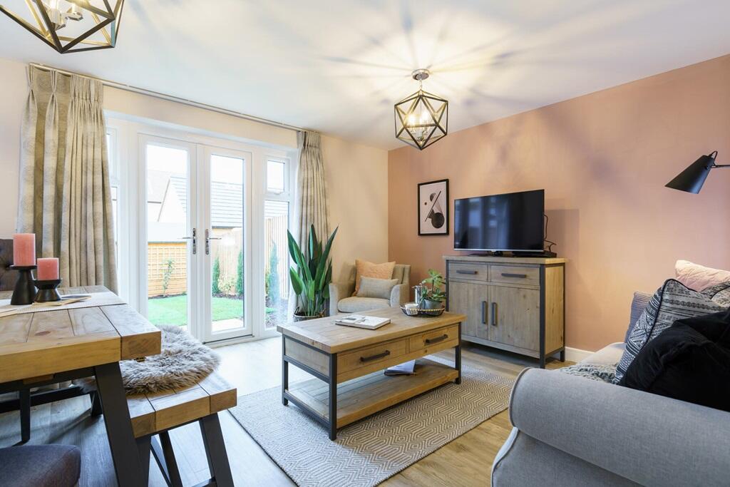 Lounge/dining room with French doors opening out to the garden