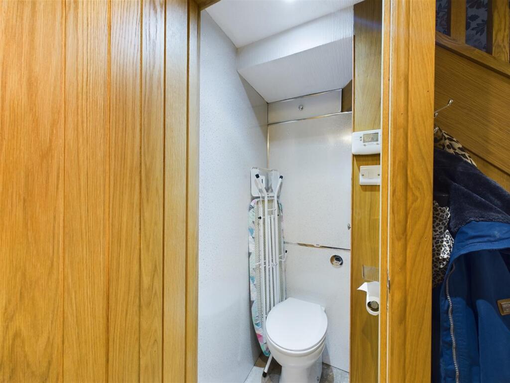 Under Stairs Cupboard and WC